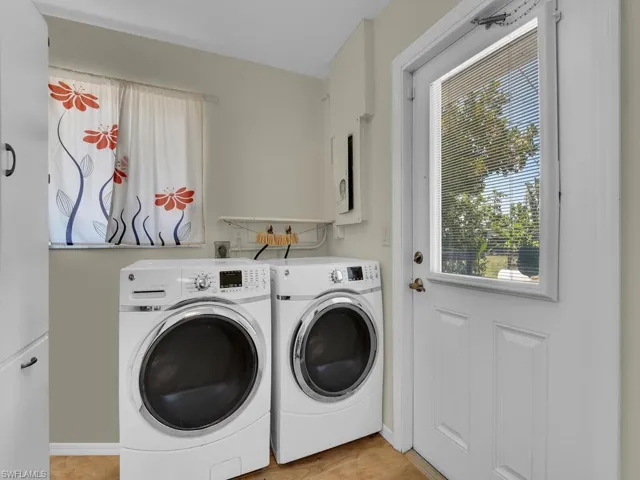 Clothes washing area with separate washer and dryer and hookup for an electric dryer