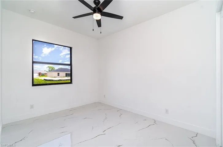 Guest bedroom #3 with ceiling fan