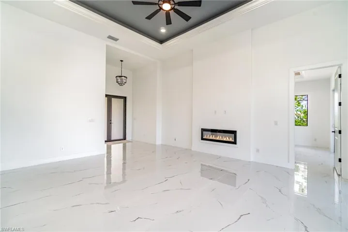 Living room with recessed wall mounted fireplace
