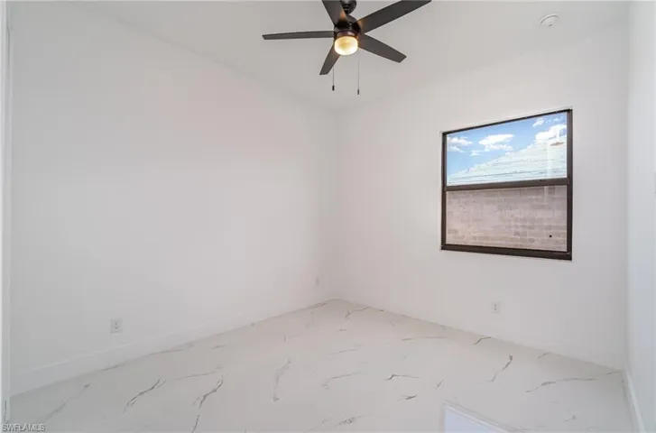 Guest bedroom #2 with ceiling fan