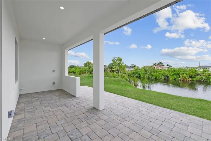 View of patio / terrace featuring a water view
