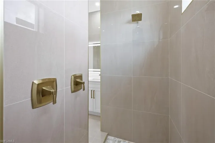 Bathroom with a tile shower