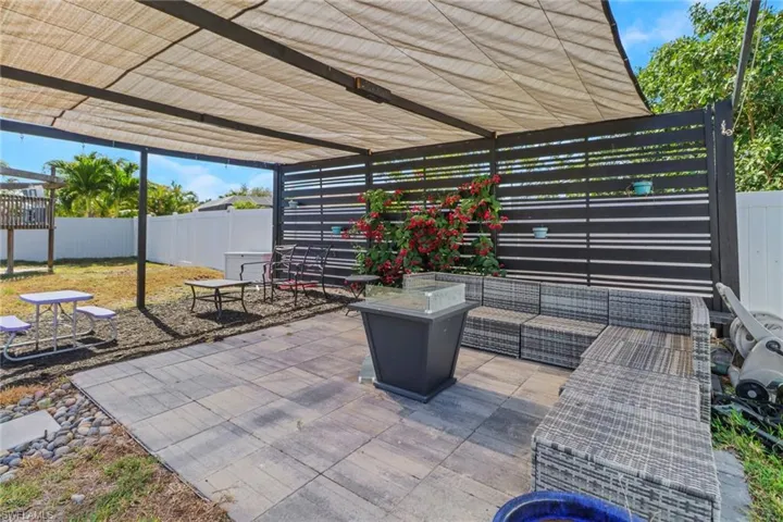 View of patio / terrace featuring an outdoor hangout area, a fenced backyard, and a pergola