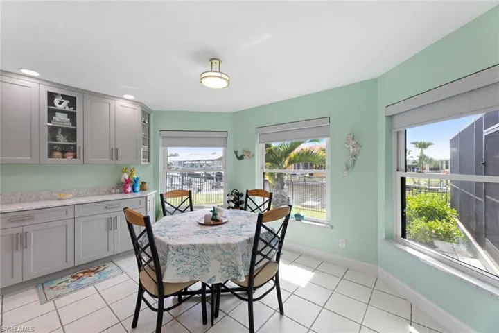 Oversized windows for great natural light in this dining space or breakfast nook