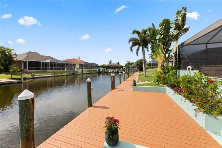 Composite dock walkway will plenty of room for lounge chairs and a tiki hut