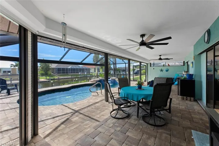 Outdoor dining area under truss