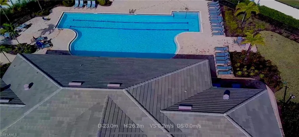 Aerial view of large pool behind clubhouse
