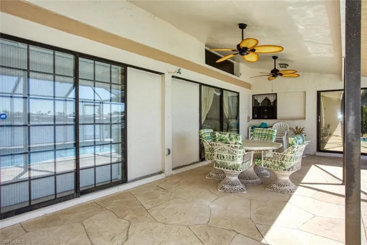 Sunroom with vaulted ceiling