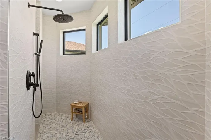 Bathroom with tiled shower