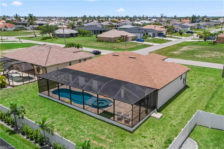 Aerial view of residential area with a pool