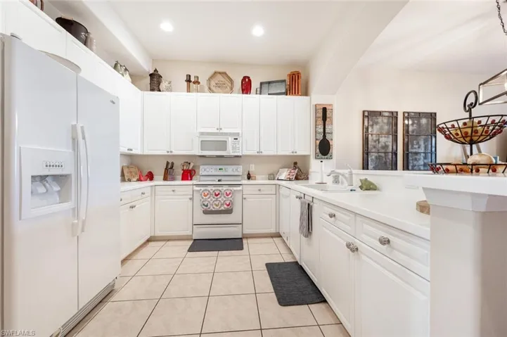 1112  Manor Lake  DR, Naples, FL 34110