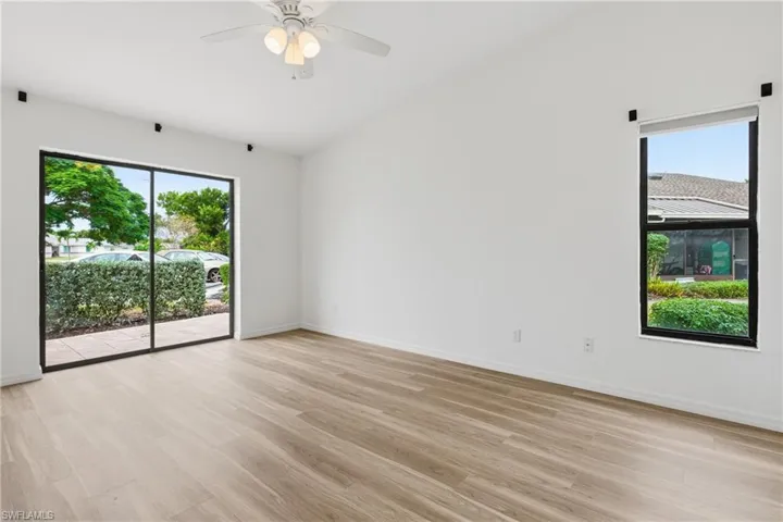 Spare room with light wood-style floors and ceiling fan