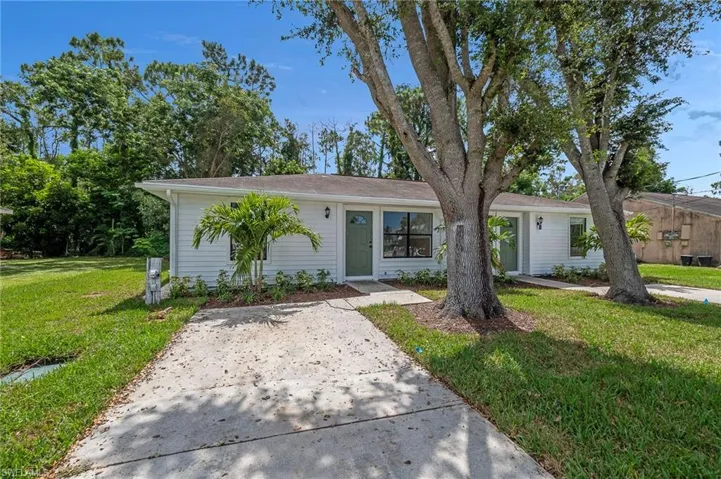 Ranch-style home with a front yard