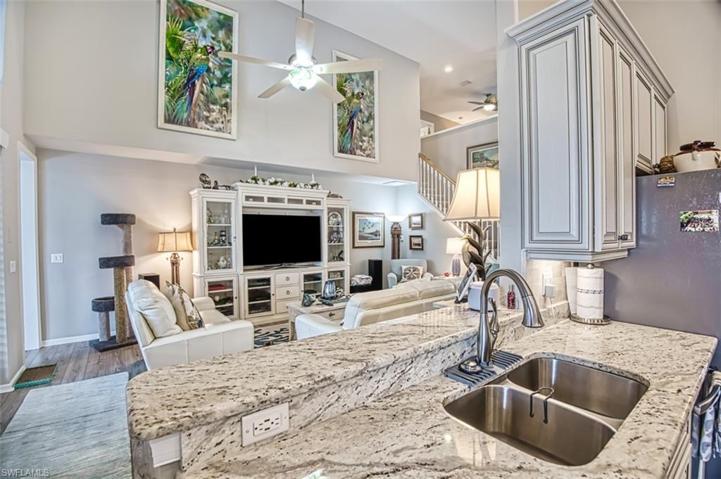 Bright open View of Kitchen into Living Room