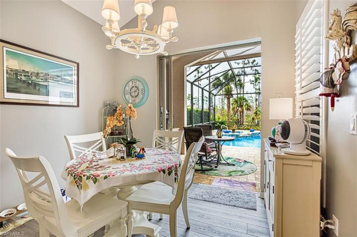 Eating Area in Kitchen with view of Lanai and Pool