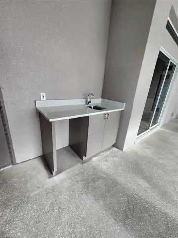 Unfurnished office with sink