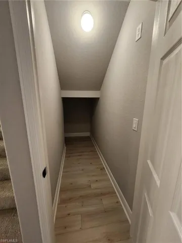 Stairway with wood-type flooring