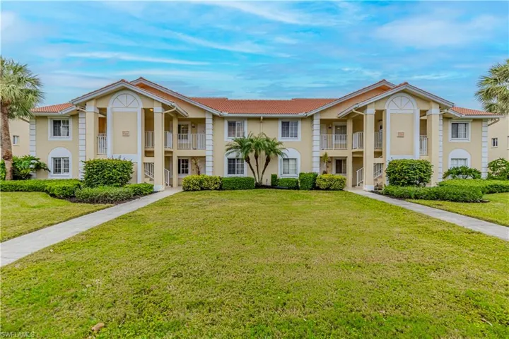 View of front of house with a front yard
