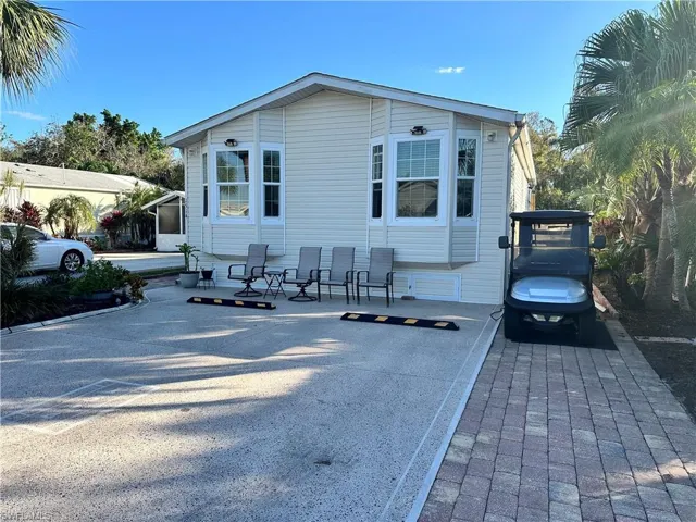 View of front of house with a patio area