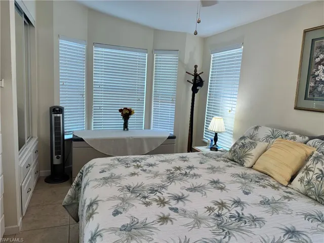 Bedroom featuring light tile patterned floors
