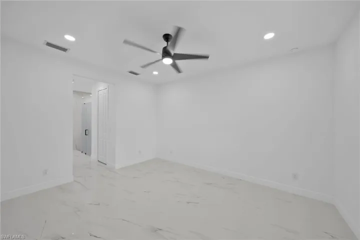 Unfurnished room with ceiling fan