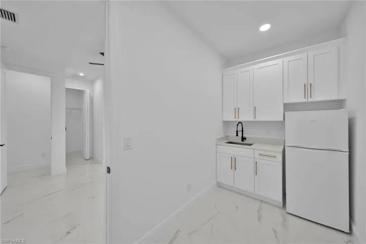 Laundry area featuring sink