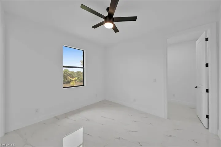 Unfurnished room with ceiling fan