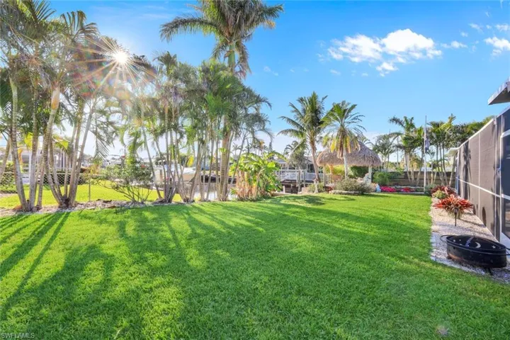 View of yard featuring fence