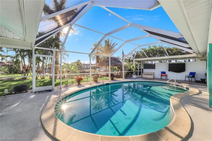 Pool featuring a patio and a lanai