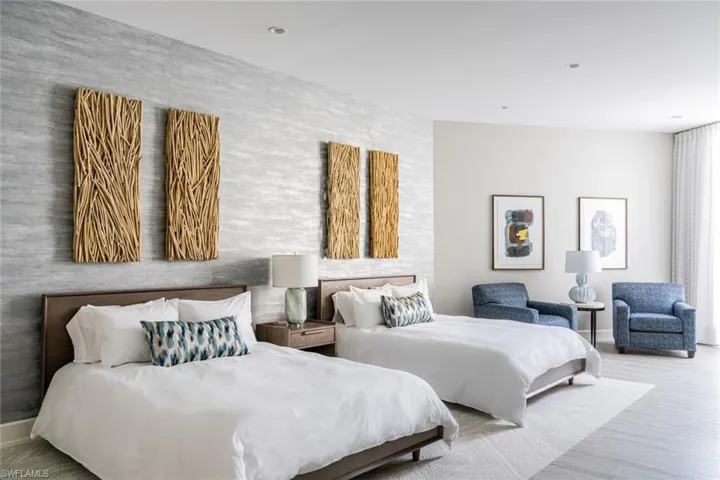 Guest suite 1 with neutral tones and abundant natural light.