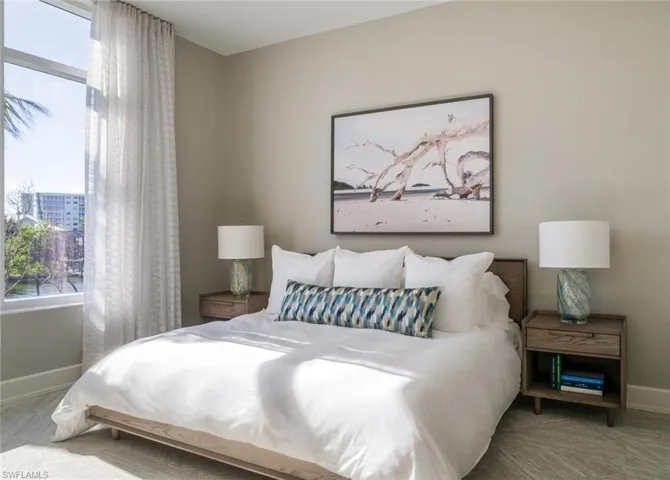 Guest suite 2 bedroom with inviting décor and natural light.
