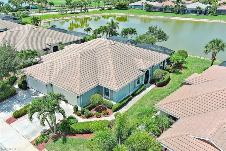BEAUTIFUL & PRIVATE WITH AN UPGRADED LAKE VIEW! PLUS AMAZING LANDSCAPING!