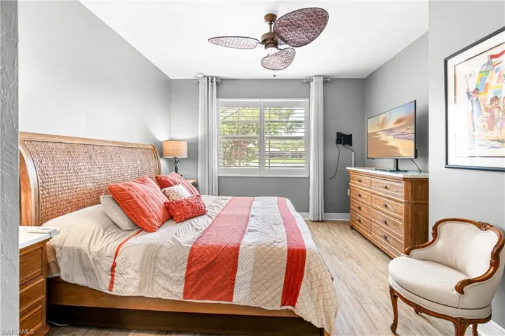 PLANTATION SHUTTERS AND LUXURY VINYL PLANK WARM UP THE SPACE