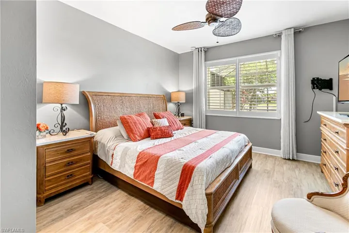 LARGE PRIMARY BEDROOM WITH LAKE VIEWS