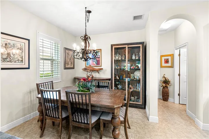 DINING AREA HAS THE SPACE TO ADD STORAGE CABINETS TO DISPLAY ALL YOUR BEAUTIFUL PIECES