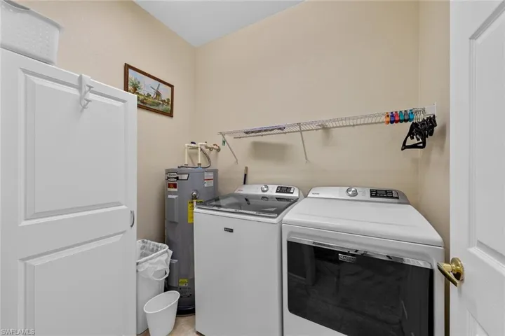 Washroom with independent washer and dryer and water heater