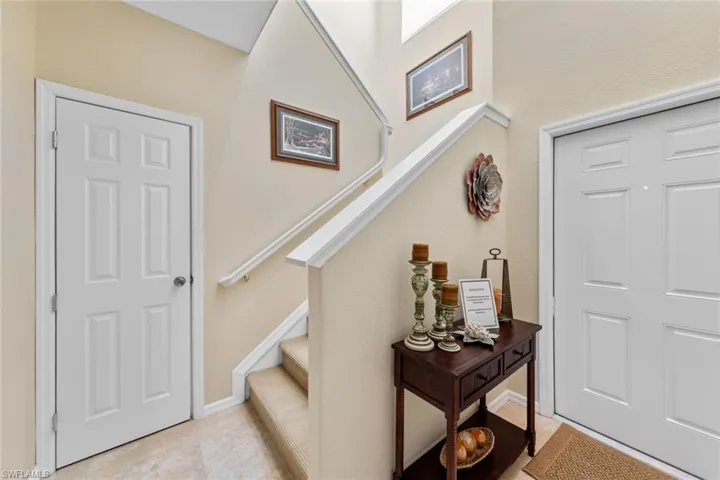 Foyer featuring light tile patterned floors