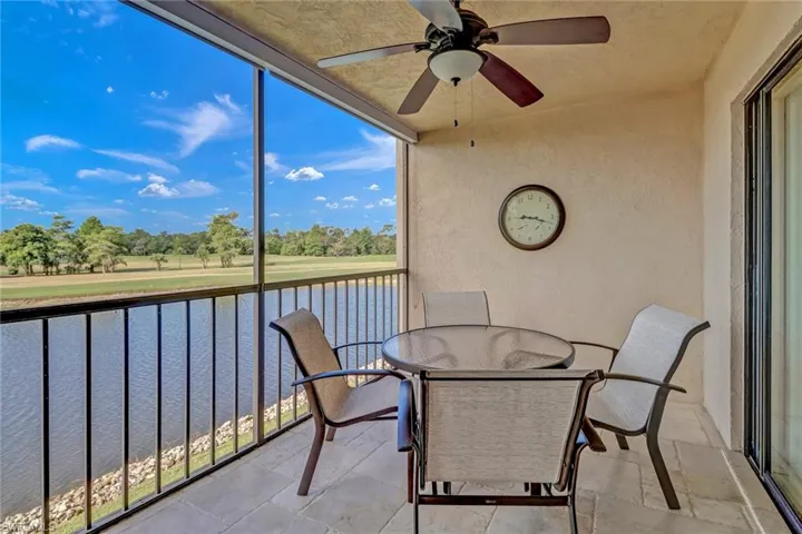 Screened Patio featuring ceiling fan