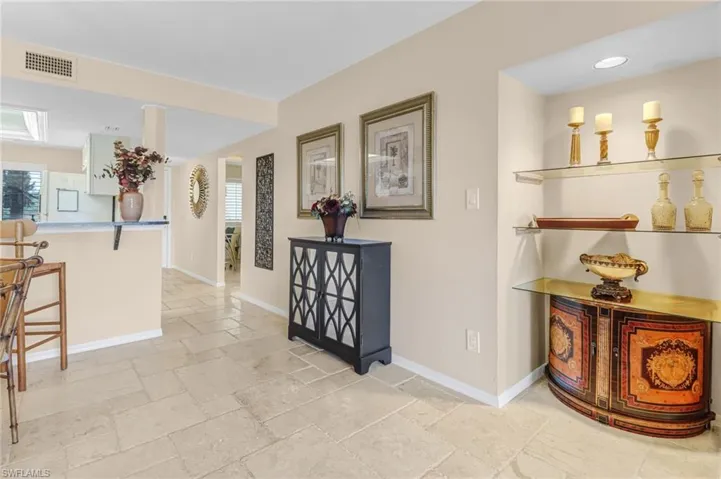 Hall with light tile floors
