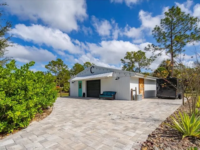 In addition to the over-sized 3-car garage, this property also has an incredible barn that can meet so many uses. It was transformed from a horse barn and could easily be converted back.
