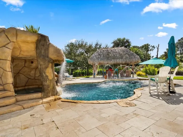 The waterslide is SO much fun but safety is paramount, so the owners recently installed a custom iron fence  around the entire pool area.