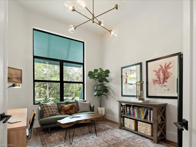 The office/den is located via french doors between the foyer and the master suite for easy access.