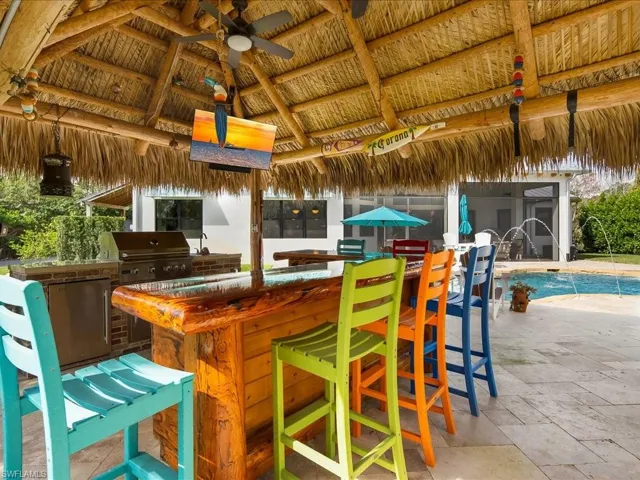 The authentic Chickee hut is such a whimsical addition. It features a brightly colored bar with a sink and built-in gas grill (hooked up to the 1,000 gallon propane tank) Sonos speakers are also installed in this space and all around the exterior of the property for entertaining music wherever you roam!