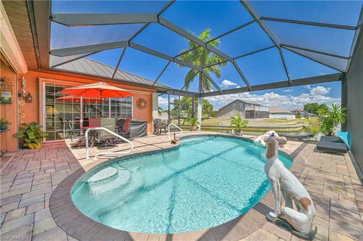 Outdoor pool featuring a patio area