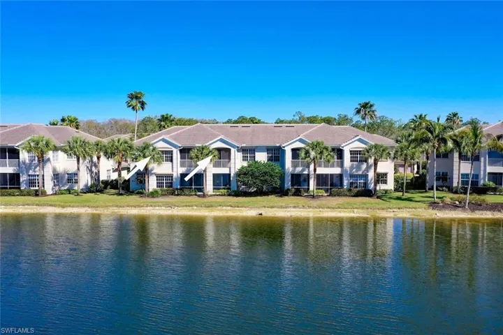 Property view of water featuring a second floor cypress hammock condo in Shadow Wood