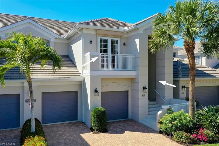 Cypress Hammock Condo exterior featuring 2 car garage and entry