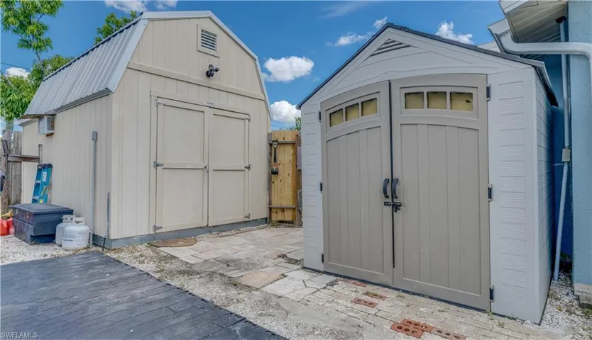 Additional vinyl storage shed.
