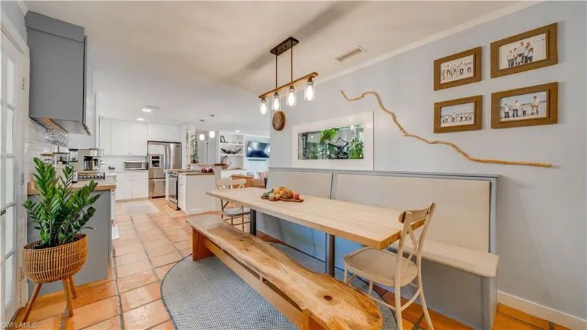 Notice the built-in  fish tank in the dining area for a very relaxing feel.
