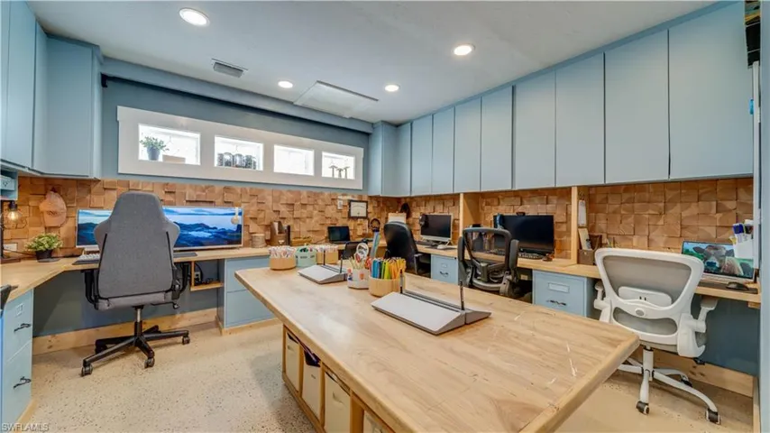 Garage has been converter to a home office/school room.