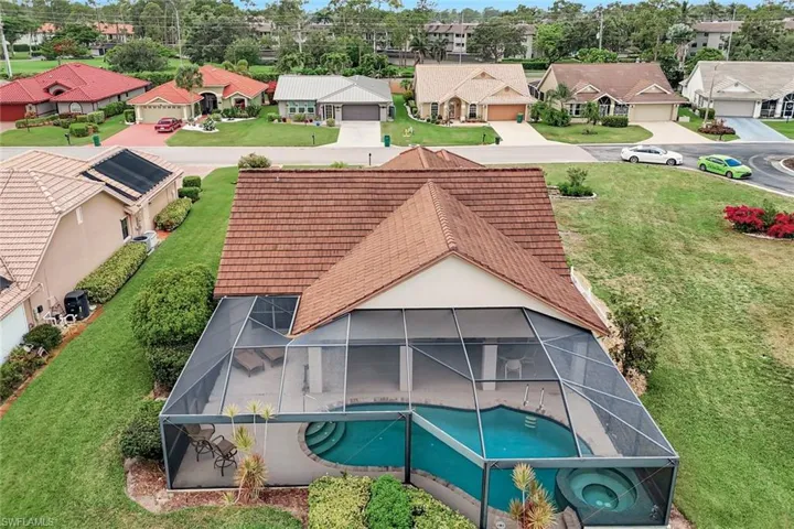 Aerial view of residential area with a pool area
